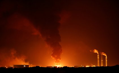 A large fire is seen near the scene of what officials said was a Gaza rocket attack on an Israeli energy pipeline near Ashkelon, Israel, May 11, 2021. REUTERS/Amir Cohen
